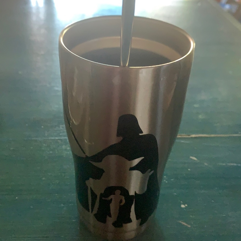 Cup whit stickers hand decorating